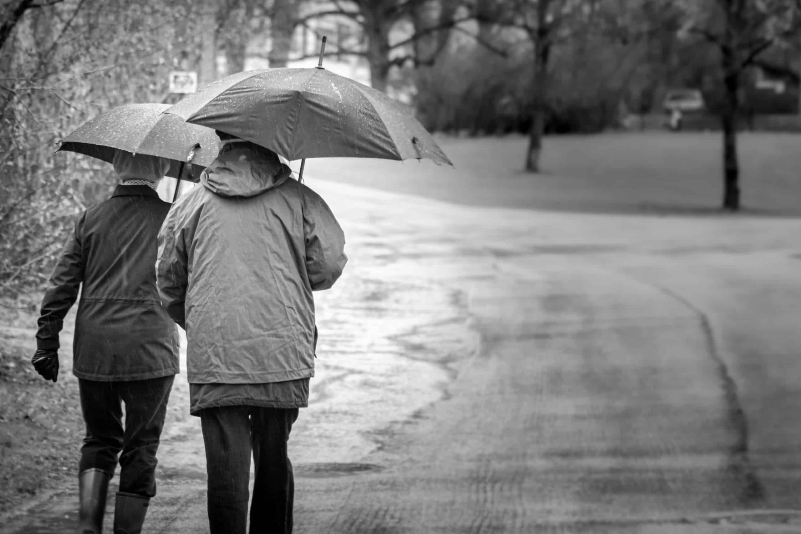 Couple walking in rain