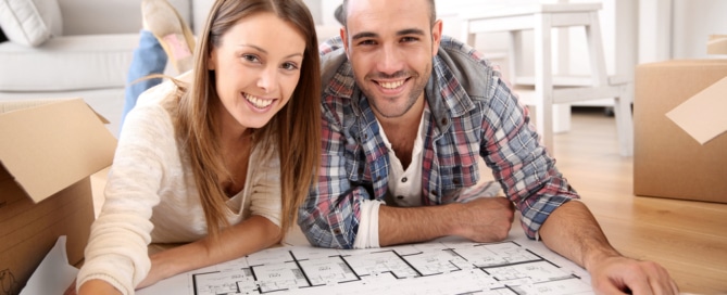 Couple pours over new construction plans