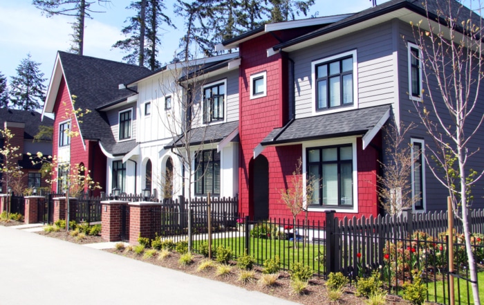 Red and Black house that has a reverse mortgage